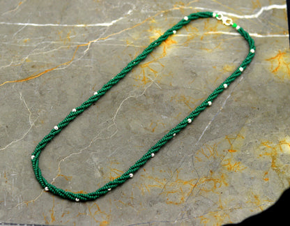 Custom made triple strand necklace with green semi-precious beads and 925 silver beads, designed in a galaxy-inspired style by TRIBAL ORNAMENTS.
