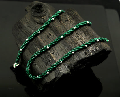 Custom made triple strand necklace with green semiprecious beads and 925 silver beads, featuring a galaxy-inspired design by TRIBAL ORNAMENTS