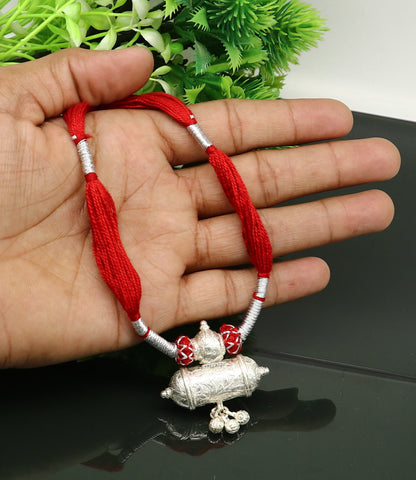 Customized Indian traditional vintage silver charm necklace with intricate tribal design, perfect for brides and wedding jewelry.