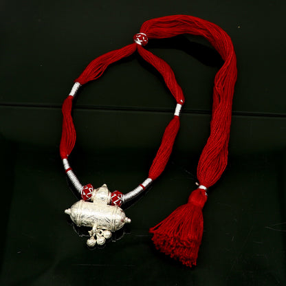 Customized Indian traditional design vintage solid silver charm necklace with intricate tribal motifs, perfect for brides and weddings.