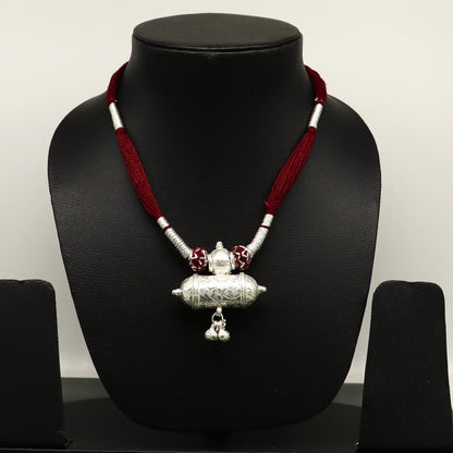Customized Indian traditional design vintage silver charm necklace with tribal motifs, ideal for brides and wedding jewelry sets.