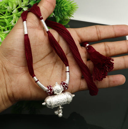 Customized Indian traditional vintage solid silver charm necklace with intricate tribal design, ideal for brides and wedding jewelry.