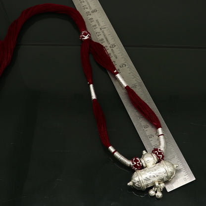 Customized Indian traditional silver charm necklace with vintage tribal design, ideal for brides and wedding jewelry sets.