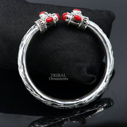 925 sterling silver bangle bracelet with red stone, antique tribal design, handmade jewelry, showcasing intricate craftsmanship.