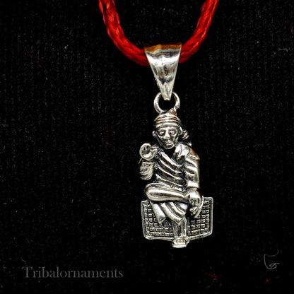 Sterling silver Sai Baba pendant by Tribal Ornaments featuring a detailed handmade Indian idol design.