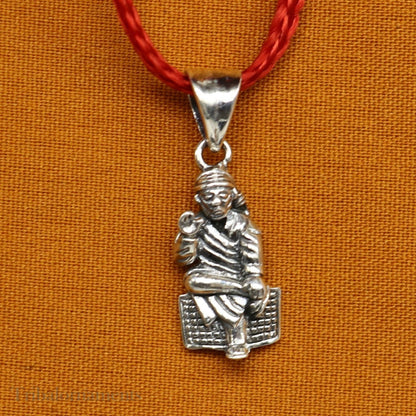 Sterling silver Sai Baba pendant by TRIBAL ORNAMENTS featuring a detailed handmade Indian idol, perfect for personalized jewelry.