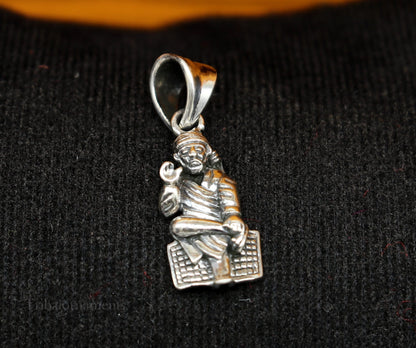 Sterling silver Sai Baba pendant by TRIBAL ORNAMENTS featuring detailed handcrafted Indian idol jewelry with personalized design.