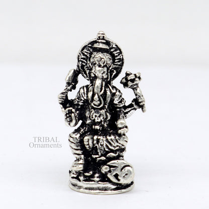 Small Divine Ganesha statue made of 925 sterling silver, ideal for home temple or car puja, from TRIBAL ORNAMENTS.