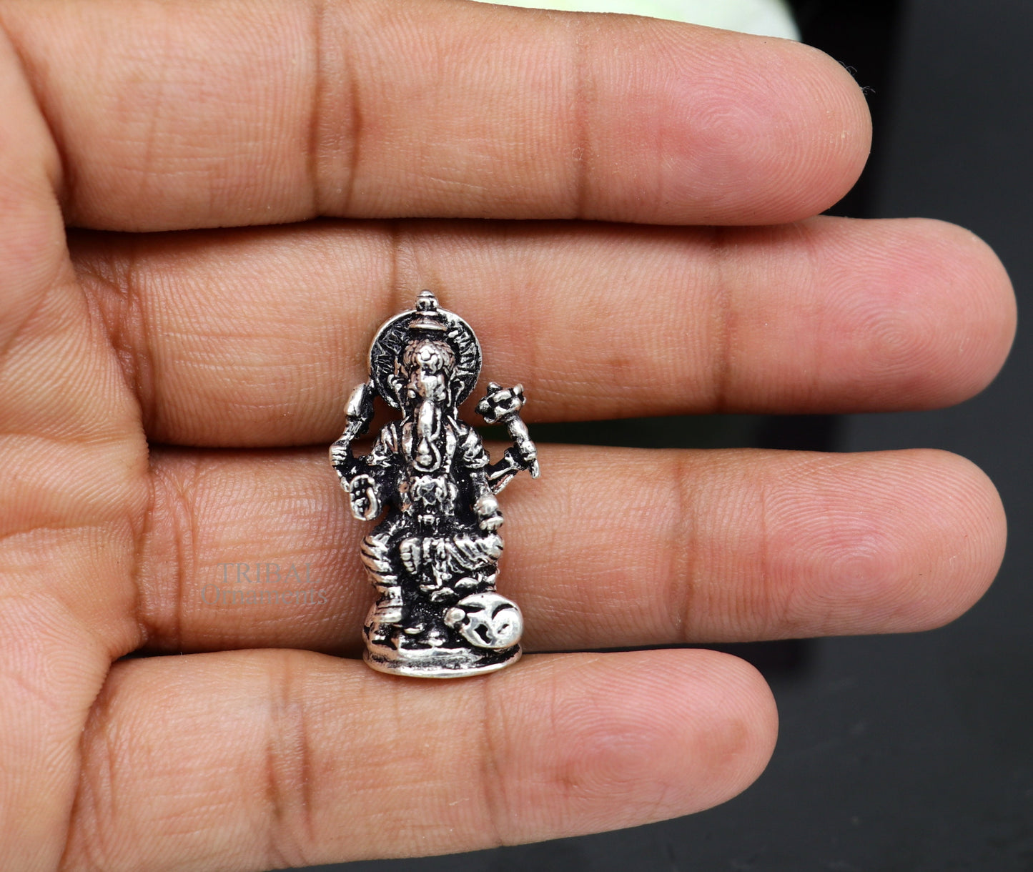 Small Divine Ganesha statue in 925 sterling silver by TRIBAL ORNAMENTS, ideal for home temple or car decor.