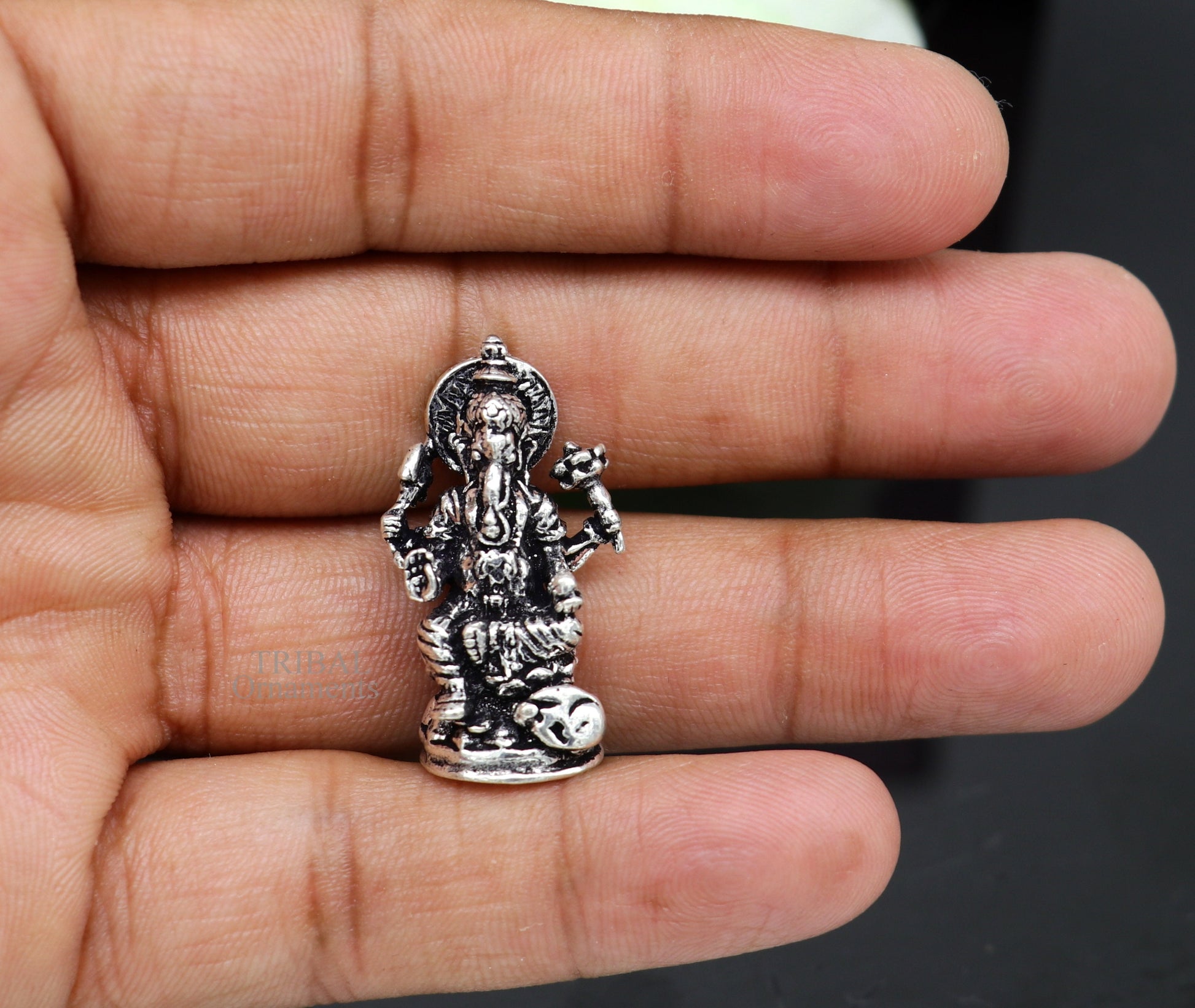Small Divine Ganesha statue in 925 sterling silver by TRIBAL ORNAMENTS, ideal for home temple or car decor.