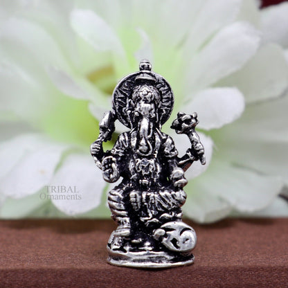 Small Divine Ganesha statue in 925 sterling silver, perfect for home temple or car decor, from TRIBAL ORNAMENTS.