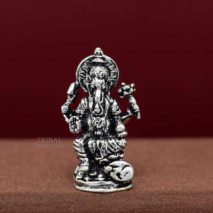 Small Divine Ganesha statue in 925 sterling silver, perfect for home temple or car decor, by TRIBAL ORNAMENTS.
