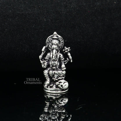 Small Divine Ganesha statue made of 925 sterling silver by Tribal Ornaments, ideal for home temple or car decor.