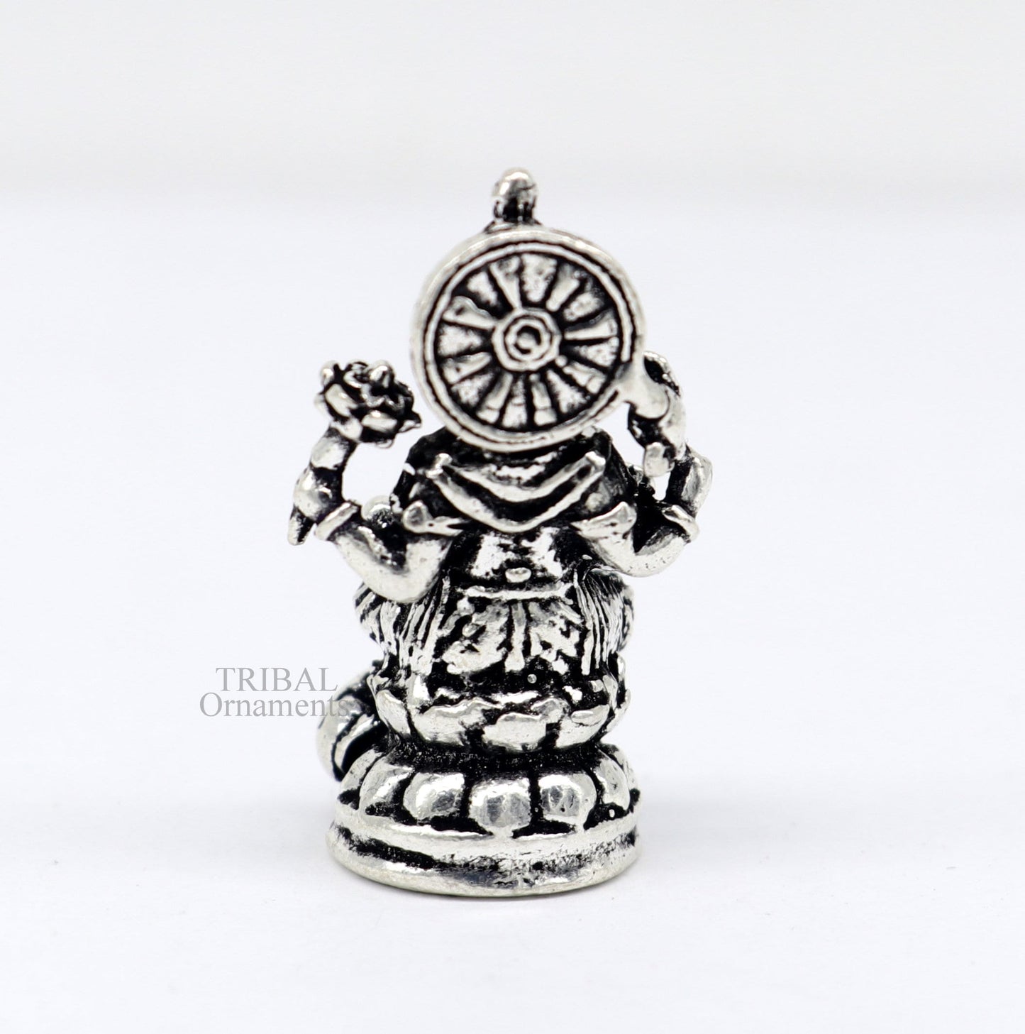 Small Divine Ganesha statue in sterling silver by Tribal Ornaments, perfect for home temple or car decor.
