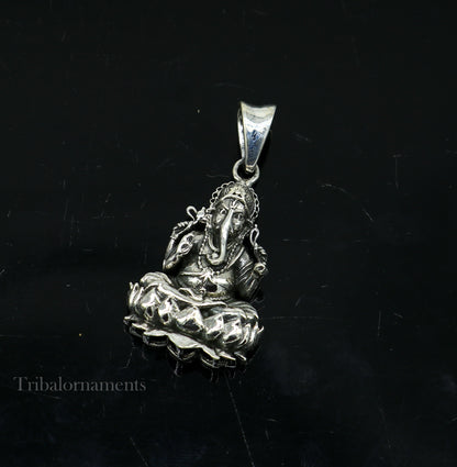 925 sterling silver Ganesha pendant with lotus design, handcrafted Indian jewelry by Tribal Ornaments featuring divine blessing motif