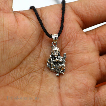 Unisex 925 sterling silver Lord Kartikya pendant with intricate tribal design, handmade Indian jewelry from TRIBAL ORNAMENTS.