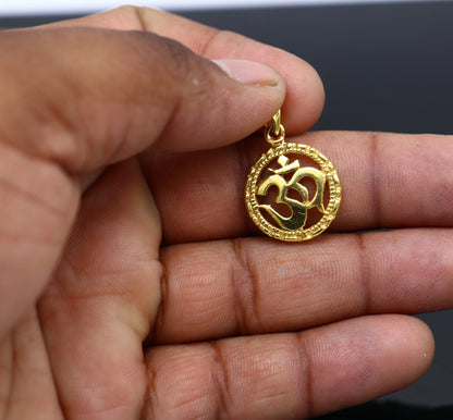 925 sterling silver OM 'AUM' pendant with gold polish, stylish unisex jewelry, handmade tribal design, divine spiritual symbol.