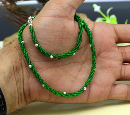 Elegant custom silver galaxy necklace with green semi-precious beads and triple chain design by Tribal Ornaments.