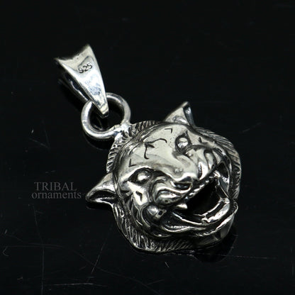 Sterling silver lion face pendant from TRIBAL ORNAMENTS, unisex handmade jewelry, detailed lion design for gifting or everyday wear.