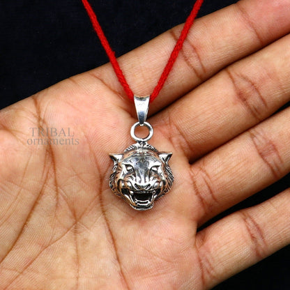 Sterling silver lion face pendant by Tribal Ornaments, handmade unisex jewelry with intricate tribal design, perfect for gifting.