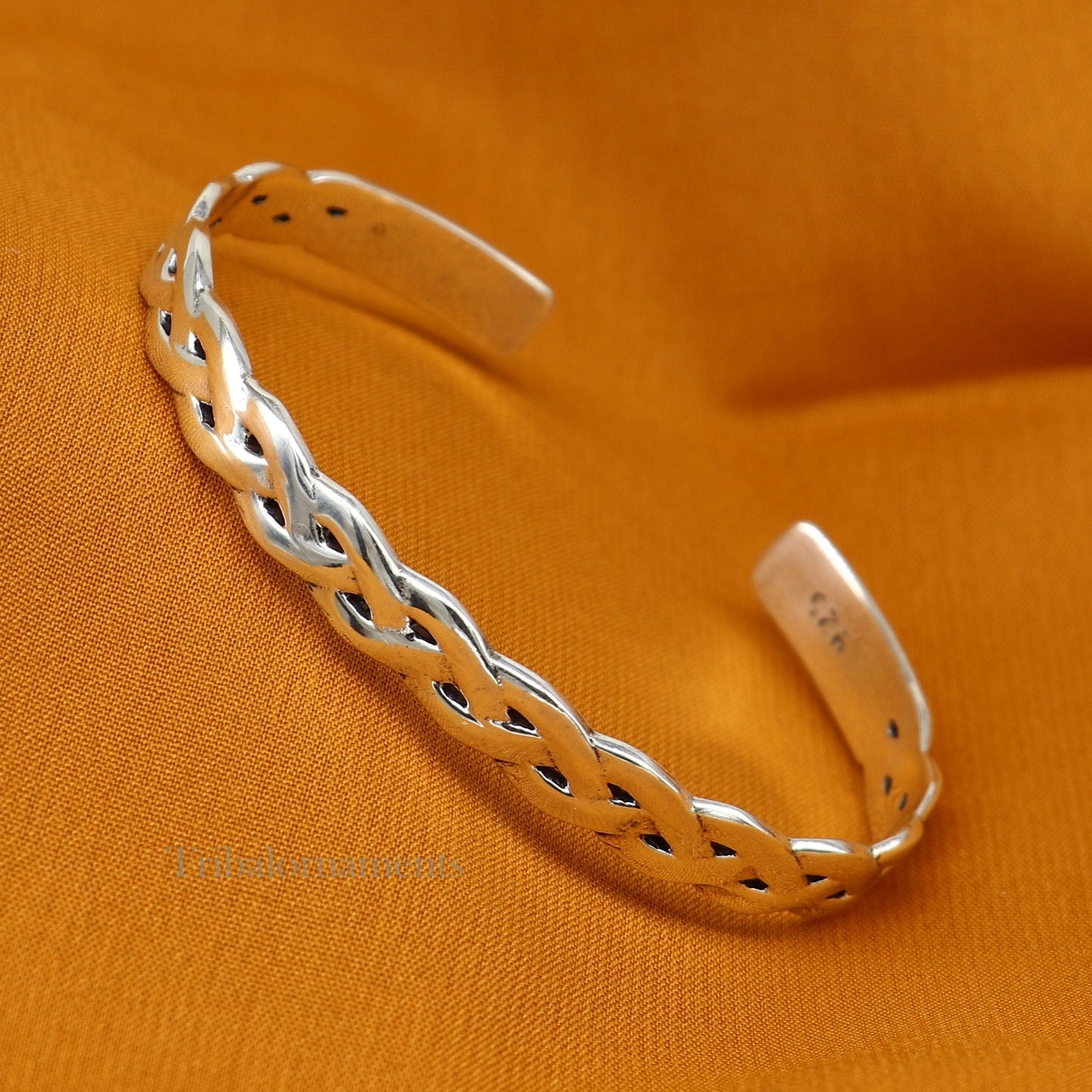 Elegant 925 sterling silver adjustable cuff bangle bracelet by Tribal Ornaments, unisex design with stylish craftsmanship.