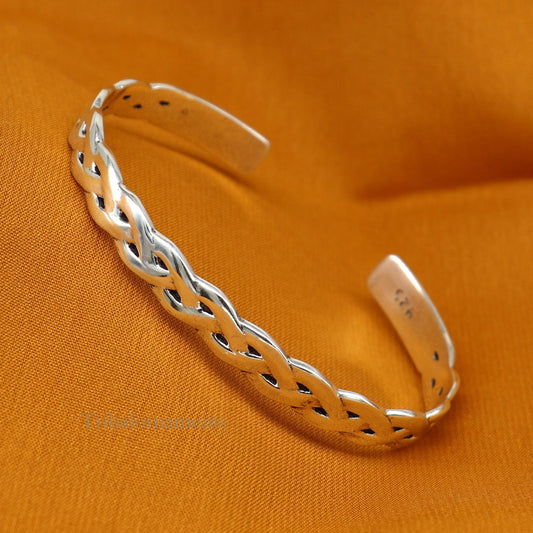 Elegant 925 sterling silver adjustable cuff bangle bracelet by Tribal Ornaments, unisex design with stylish craftsmanship.