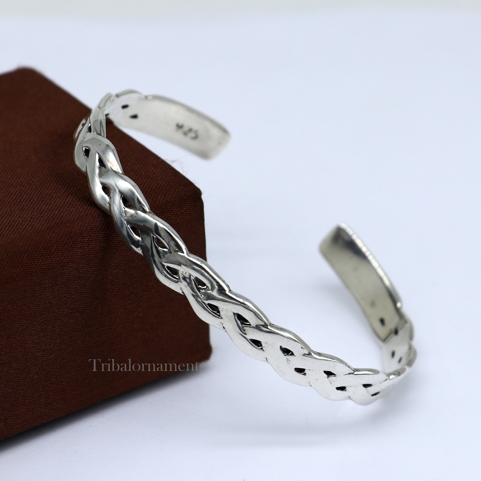 Elegant 925 sterling silver adjustable cuff bangle bracelet by Tribal Ornaments, unisex design with stylish handmade details.
