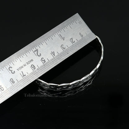 Elegant 925 sterling silver adjustable cuff bangle bracelet by Tribal Ornaments, unisex design with intricate detailing.
