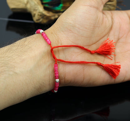 Elegant tribal anklet with semi-precious ruby stones and 925 silver beads, custom-made beaded jewelry for stylish ankles.