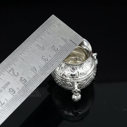 Small handmade 925 sterling silver Kalash pot for puja, featuring a plain design, used for water or milk offerings in India.