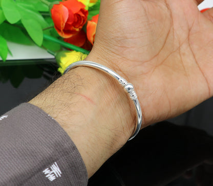 Sterling silver round bangle bracelet by TRIBAL ORNAMENTS with a shiny, plain finish, perfect for brides and belly dance jewelry.