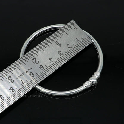 Sterling silver round bangle bracelet with a shiny finish, stylish and elegant jewelry for brides and belly dance accessories.