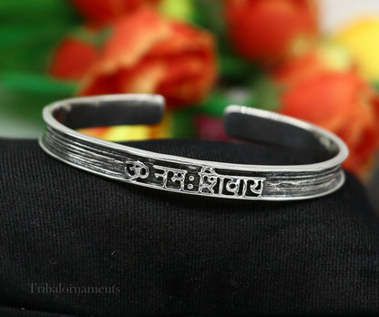 Unisex 925 sterling silver "Aum Namah Shivay" mantra cuff bangle bracelet with handmade, adjustable tribal design jewelry.