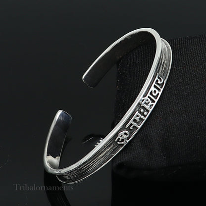 Unisex 925 sterling silver "Aum Namah Shivay" mantra cuff bangle bracelet with handmade tribal design and adjustable fit.