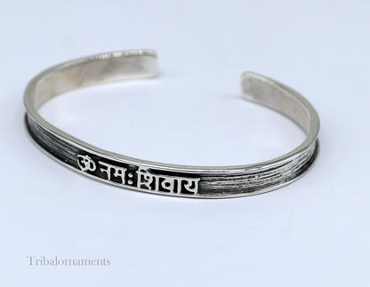 Unisex 925 sterling silver "Aum Namah Shivay" mantra cuff bangle bracelet with handmade tribal design, adjustable jewelry.