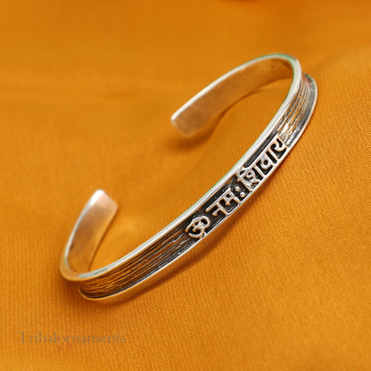 Unisex 925 sterling silver "Aum Namah Shivay" mantra cuff bangle bracelet with adjustable design from TRIBAL ORNAMENTS.