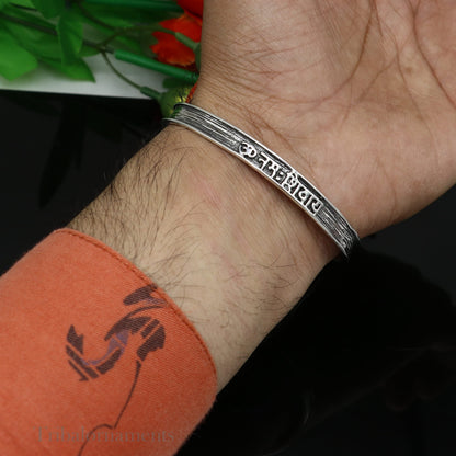 925 sterling silver "Aum Namah Shivay" mantra cuff bracelet by TRIBAL ORNAMENTS, unisex handmade adjustable bangle jewelry.