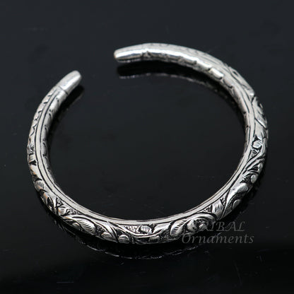 925 sterling silver chitai nakshi work unisex cuff bangle by TRIBAL ORNAMENTS with oxidized design and handmade craftsmanship.
