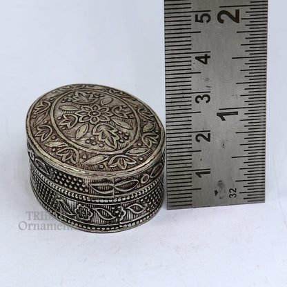 Small bridal kajal box made of 925 sterling silver, decorative jewelry and trinket container with intricate tribal design.