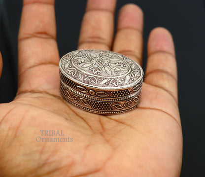 Small bridal kajal box in 925 sterling silver by Tribal Ornaments, featuring intricate tribal art for jewelry or trinkets.