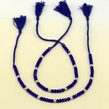 Semi-precious blue stone and 925 silver beads on a custom-made tribal-inspired anklet from Tribal Ornaments.