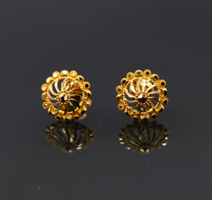 22Kt yellow gold handmade filigree stud earrings from Tribal Ornaments, featuring intricate traditional and modern Indian jewelry design.