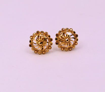 22Kt yellow gold handmade filigree stud earrings by TRIBAL ORNAMENTS, stylish modern Indian ethnic jewelry with intricate design