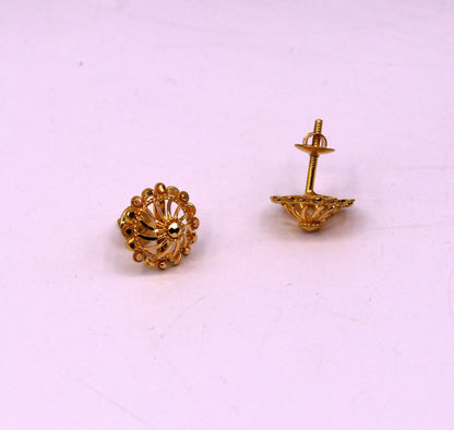 22Kt yellow gold handmade filigree stud earrings by Tribal Ornaments, featuring intricate traditional Indian ethnic jewelry design.