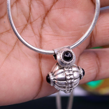 Handmade sterling silver vintage pendant necklace with black stone, tribal jewelry design from India, by TRIBAL ORNAMENTS.