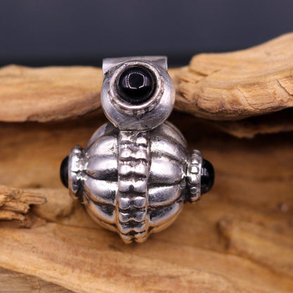 Handmade vintage sterling silver pendant necklace with black stone, tribal design from India, crafted by Tribal Ornaments.