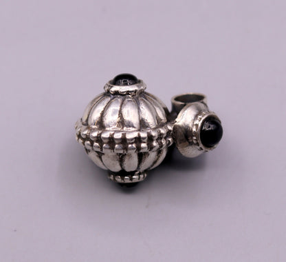 Handmade sterling silver vintage black stone pendant necklace with tribal design from India, showcasing intricate antique craftsmanship.