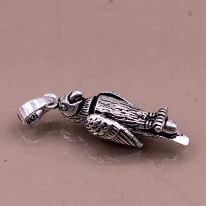 Sterling silver parrot-shaped pendant from Tribal Ornaments, unisex handmade jewelry, detailed and attractive for gifting or casual wear.