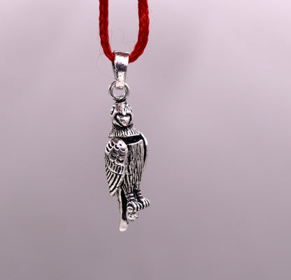 Sterling silver parrot-shaped pendant from Tribal Ornaments, handmade unisex jewelry with detailed, attractive design.