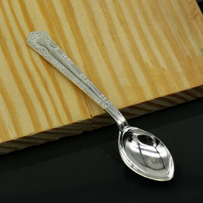 Sterling silver handmade 5-inch spoon from Tribal Ornaments, featuring a polished finish and antibacterial properties for healthy kitchen use.